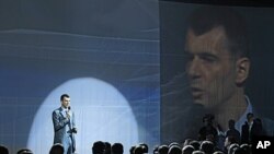 Russian tycoon Mikhail Prokhorov speaks at a meeting of the Right Cause party in Moscow, June 25, 2011.