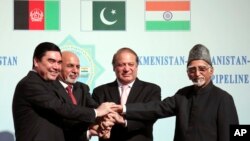 FILE - Turkmen President Gurbanguly Berdymukhamedov (L) shakes hands with Afghan President Ashraf Ghani (2nd-L), then-Pakistani Prime Minister Nawaz Sharif (2nd-R), and Indian Vice President Hamid Ansari during a ceremony in Ashgabat, Turkmenistan, Dec. 13, 2015. 