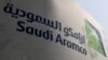 FILE — Saudi Aramco logo is pictured at the oil facility in Khurais, Saudi Arabia, Oct. 12, 2019. 