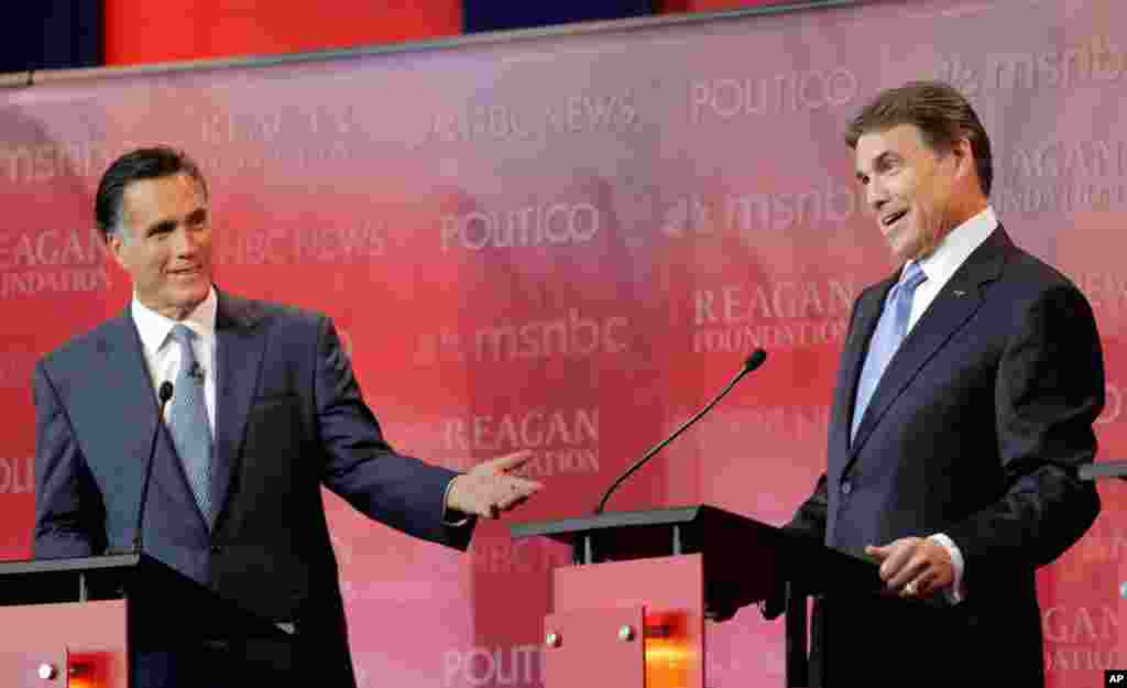 September 7: Republican presidential candidates Mitt Romney, left, and Rick Perry during a Republican presidential candidate debate in Simi Valley, Calif. (AP Photo/Jae C. Hong)