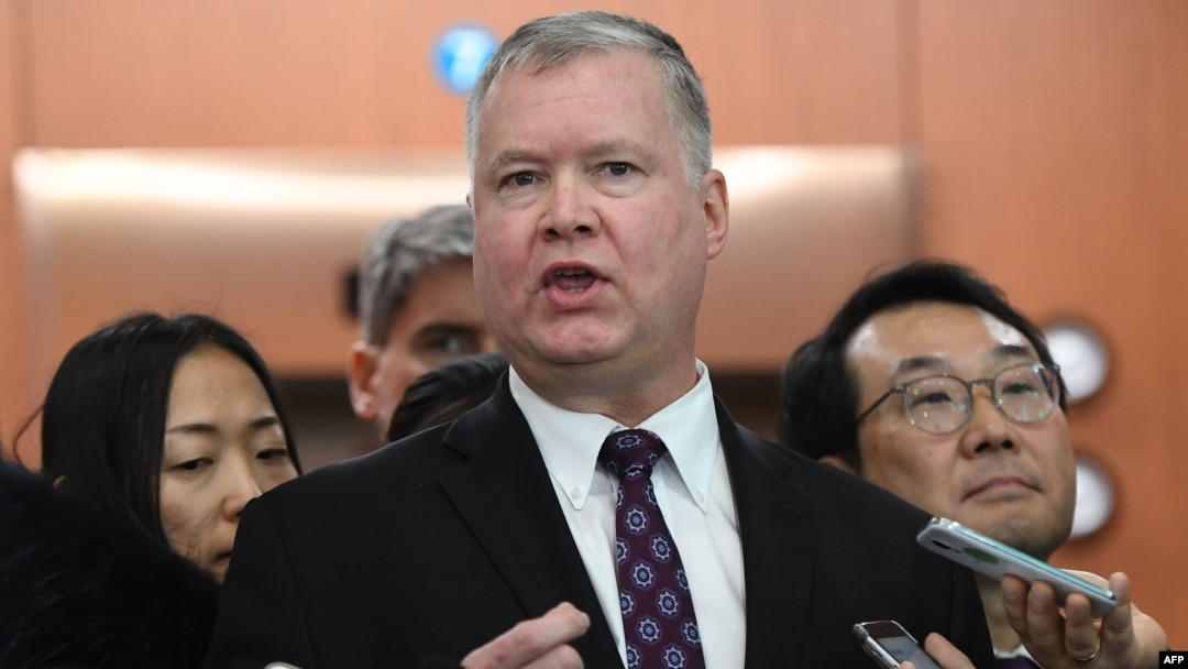 U.S. special representative on North Korea Stephen Biegun, center, speaks to reporters as his South Korean counterpart Lee Do-hoon, right, looks on after their "working group" meeting handling North Korean issues at the Foreign Ministry in Seoul on Dec.