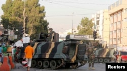 Lebanese army soldiers are deployed on the edge of the Palestinian refugee camp of Shatila in Beirut, after clashes June 30, 2014.