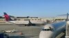 Un avion de Delta Airlines se trouve sur le tarmac de l'aéroport international de Milwaukee Mitchell (MKE) à Milwaukee, Wisconsin, le 8 janvier 2020. (Photo de Daniel SLIM / AFP)