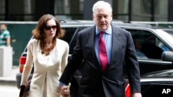 Conrad Black arrives at Federal Courthouse with his wife Barbara Amiel, Friday, June 24, 2011 in Chicago.