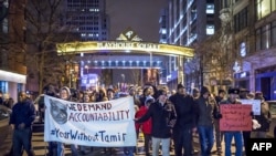 ARCHIVES - Les manifestants dans les rues de Cleveland le 29 décembre 2015.