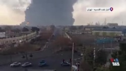  آتش‌سوزی ناشی از حمله به انبار نفت اقدسیه در انتهای بزرگراه ارتش در شرق تهران - منبع وحیدآنلاین