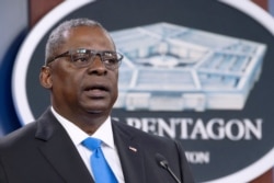 FILE - Defense Secretary Lloyd Austin speaks at a press briefing at the Pentagon in Arlington, Virginia, July 21, 2021.