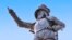 This undated image provided by the St. Augustine, Ponte Vedra & The Beaches Visitors and Convention Bureau shows a statue of Spanish explorer Ponce de Leon located at the foot of the Bridge of Lions in St. Augustine’s Plaza de La Constitucion in St. Augus