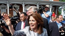 Rep. Michele Bachmann, R-Minn., waves to supporters after making her formal announcement to seek the 2012 Republican presidential nomination, Monday, June 27, 2011, in Waterloo, Iowa. Bachmann, who was born in Waterloo, will continue her announcement tour