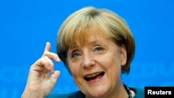 Sosyal demokratlarla hükümet kuran Almanya Başbakanı Angela Merkel