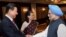 2014年9月19日中国国家主席习近平在印度访问期间会见了印度前总理辛格。