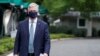 FILE - White House National Security Adviser Robert O'Brien walks after being interviewed at the White House in Washington, May 24, 2020.