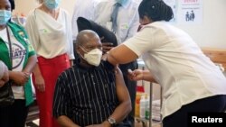 FILE PHOTO - Former South African Health Minister Zweli Mkhize receiving the Johnson and Johnson COVID-19 vaccine at the Khayelitsha Hospital near Cape Town, South Africa, Feb. 17, 2021.