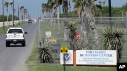 A U.S. Border Patrol truck enters the Port Isabel Detention Center, which holds detainees of U.S. Immigration and Customs Enforcement, June 26, 2018, in Los Fresnos, Texas.