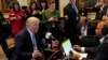 U.S. President Donald Trump speaks during a radio interview on tax reform at the White House in Washington, Oct. 17, 2017. 