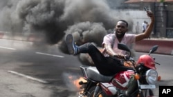 People protest in Kinshasa, Democratic Republic of the Congo Jan. 28, 2025, against the Rwanda-backed M23 rebels' advances into eastern Congo's capital Goma.