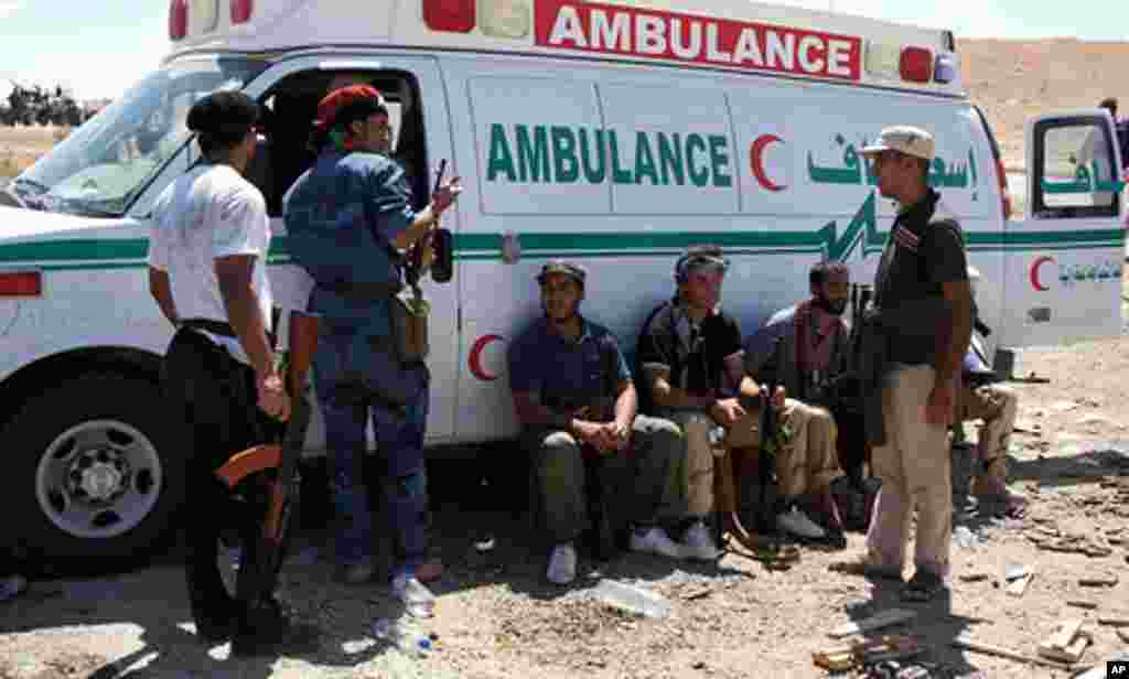 Ambulances race to and from Bani Walid, September, 10 2011. - E. Arrott