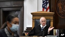 Judge Bruce E. Schroeder questions potential jurors to serve for Kyle Rittenhouse's trial at the Kenosha County Courthouse in Kenosha, Wisconsin, Nov. 1, 2021. 
