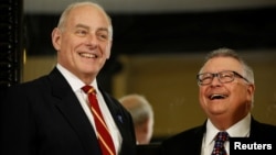 U.S. Homeland Security Secretary John Kelly, left, visits with Canada's Public Safety Minister Ralph Goodale on Parliament Hill in Ottawa, March 10, 2017.