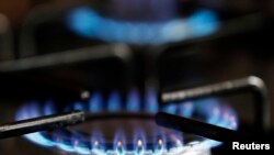 FILE: A gas burner is pictured on a stove in a private home in Bordeaux, southwestern France, January 21, 2014.