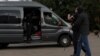 FILE - Law enforcement officers detain a journalist in central Minsk, Belarus, Aug. 27, 2020.