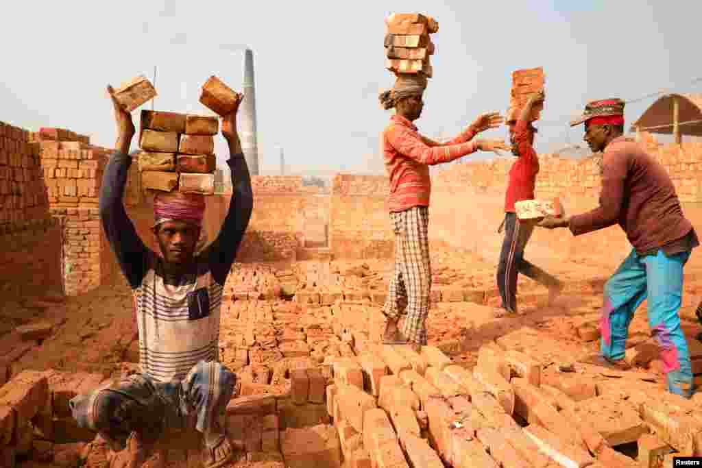 Laborers work in a brick kiln in Narayanganj, Bangladesh.