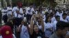 Demonstrators rally in Yangon on Jan. 22, 2017, to denounce the country's controversial sweeping telecommunications law.