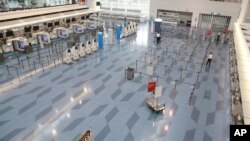 지난달 일본 도쿄 하네다 국제공항 출발탑승구가 신종 코로나바이러스 사태로 텅 비어있다. 