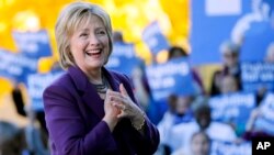 FILE - Democratic presidential candidate Hillary Rodham Clinton acknowledges supporters after filing papers to be on the nation's earliest presidential primary ballot in Concord, N.H., Nov. 9, 2015.