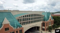 The Wisconsin Center is seen, Aug. 5, 2020, in Milwaukee. Joe Biden will not travel to Milwaukee to accept the 2020 Democratic presidential nomination because of concerns about the coronavirus, party officials said Aug. 5.