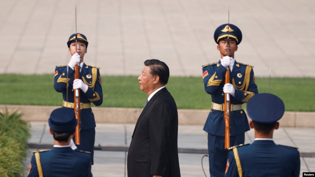 China's President Xi Jinping attends a wreath laying ceremony on Tiananmen Square to mark Martyrs' Day, in Beijing