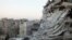 Buildings damaged by what activists said was shelling by forces loyal to Syrian President Bashar al-Assad, Al-Khalidiya neighbourhood, Homs June 28, 2013.