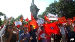 Hundreds of Vietnamese hold a rare protest in Hanoi demanding China stay out of their country's waters Sunday, June 5, 2011.