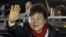 South Korea's presidential candidate Park Geun-hye of ruling Saenuri Party waves to her supporters near the party's head office in Seoul, South Korea, Dec. 19, 2012. 