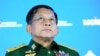 FILE - Myanmar's Senior General Min Aung Hlaing delivers his speech at the IX Moscow conference on international security in Moscow, Russia, June 23, 2021.