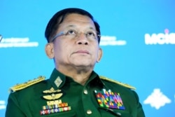 FILE - Commander-in-Chief of Myanmar's armed forces, Senior General Min Aung Hlaing delivers his speech at the IX Moscow conference on international security in Moscow, June 23, 2021. (AP Photo/Alexander Zemlianichenko, Pool)