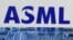 ILUSTRASI - Logo ASML di dekat motherboard komputer, 8 Januari 2024. (Dado Ruvic/REUTERS)