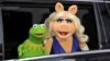 Kermit the Frog and Miss Piggy arrive at the World Premiere of "Muppets Most Wanted," March 11, 2014, in Los Angeles.