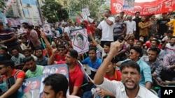 FILE - Activists of the Bangladesh Nationalist Party shout slogans during a protest in Dhaka, Bangladesh, on Oct. 28, 2023. The demonstrators demanded that Prime Minister Sheikh Hasina transfer power to a nonpartisan caretaker government to oversee general elections next year.