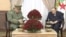 FILE - Algeria's President Abdelaziz Bouteflika, right, meets with Army Chief of Staff Lieutenant General Ahmed Gaid Salah in Algiers, Algeria, in this handout still image taken from a TV footage released on March 11, 2019. 