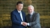 Chinese President Xi Jinping shakes hands with Brazilian President Luiz Inacio Lula da Silva after a meeting at Alvorada Palace in Brasilia on Nov. 20, 2024.