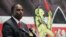 Kenya's acting Finance Minister Ukur Yatani speaks during a budget planning meeting in Nairobi. President Uhuru Kenyatta’s government offered to add 50 billion shillings ($462 million), to the 15% of national revenue that counties are entitled to.