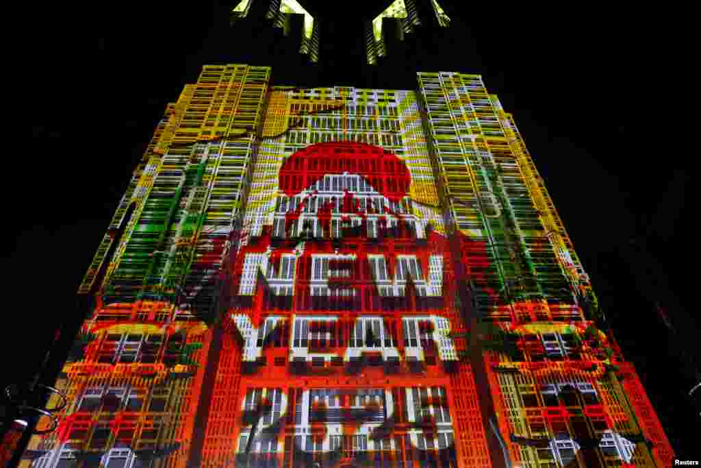 A projection mapping is displayed on the surface of the Tokyo Metropolitan Government building, to celebrate the New Year, in Tokyo, Japan Jan. 1, 2025. 