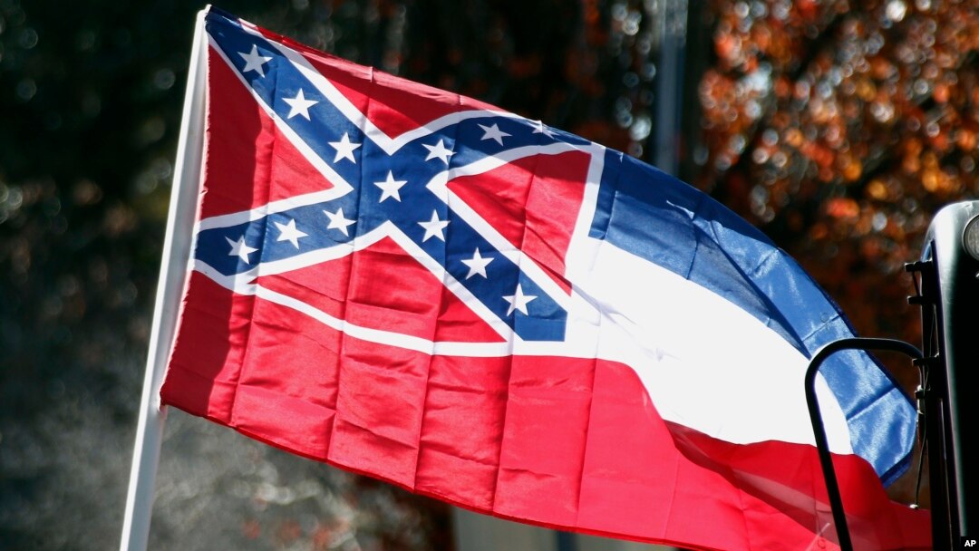 FILE - The state flag of Mississippi is unfurled on the grounds of the state Capitol in Jackson, Mississippi, Jan. 19, 2016. An effort to erase the Confederate battle emblem from the Mississippi flag has failed because sponsors didn't gather enough signatures to put an initiative on the 2018 ballot.