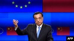 FILE — Chinese Prime Minister Li Keqiang, who died Oct. 26, 2023, speaks at EU headquarters in Brussels on April 9, 2019. The late leader is remembered by Uyghur and Tibetan communities for his leading role in the crackdown on Muslims in Xinjiang and Tibetans in Tibet.