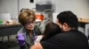 A child braces for a measles vaccine at a health center in Lubbock, Texas, Feb. 27, 2025.