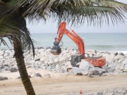 As Ghana's coasts erode, the government is putting up sea walls which some hotels say have a negative impact on business. Sept 30, 2020 (VOA/Stacey Knott)