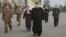 North Korean leader Kim Jong Un (C) visits the Phyongchon Revolutionary Site, in this undated photo released by North Korea's Korean Central News Agency (KCNA) in Pyongyang, Dec. 10, 2015.