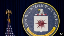 FILE - This April 13, 2016 file photo shows the seal of the Central Intelligence Agency at CIA headquarters in Langley, Va.