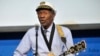 FILE - Rock 'n' roll legend Chuck Berry performs "Johnny B. Goode" at the John F. Kennedy Presidential Library and Museum in Boston, Feb. 26, 2012. 